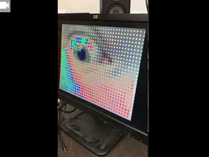 A multicolored digital display of an eye 